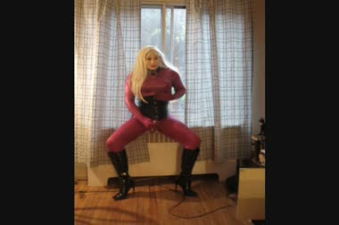 Naughty Transsexual Doll Masturbation - Vanessa fetish in dollification, wearing pink catsuit, boots and corset with her female mask, masturbating for you